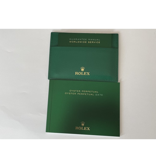 New Rolex Oyster Perpetual booklet set with guarantee manual and leather holder