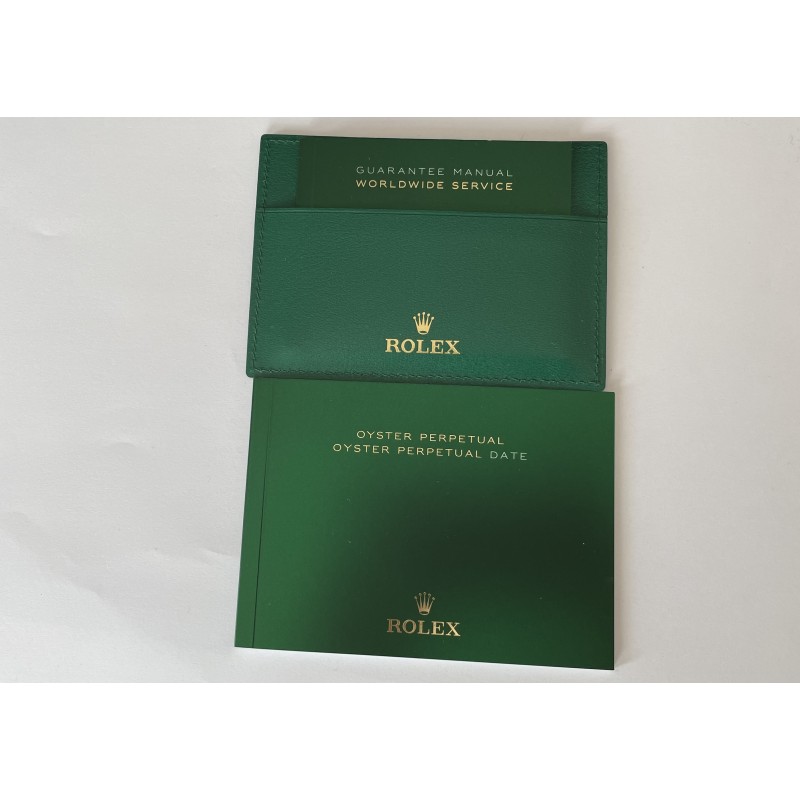 Комплект книжки Rolex Oyster Perpetual с гаранционен мануал и кожен калъф Комплект книжки Rolex Oyster Perpetual с гаранционен мануал и кожен калъф